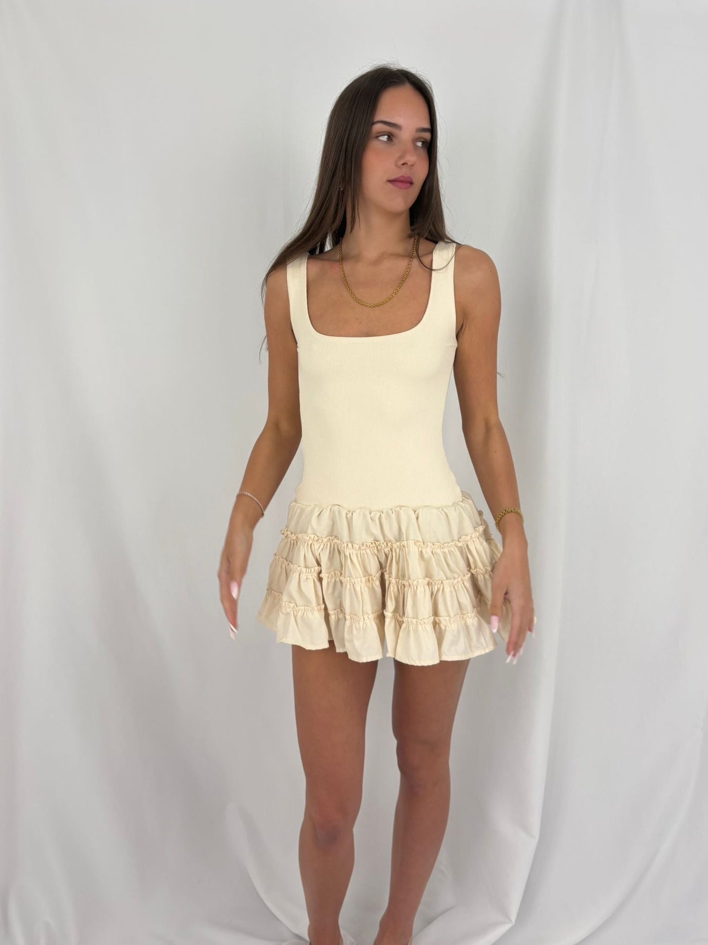 The Ruffle Skirt Mini Dress in Beige